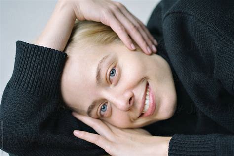 Portrait Of A Smiling Blonde By Stocksy Contributor Ivan Ozerov Stocksy