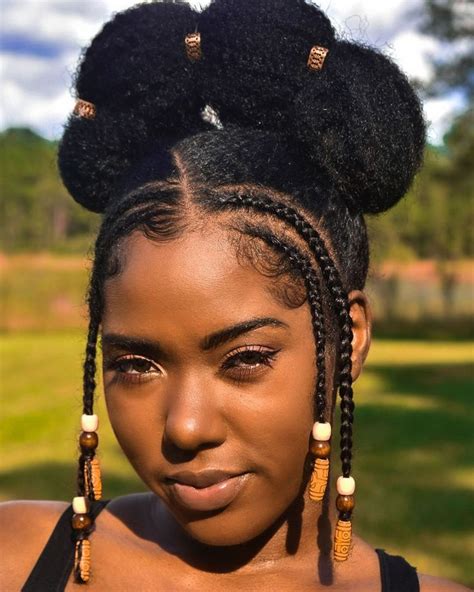 25 beautiful black women unapologetically rocking creative natural hairstyles essence