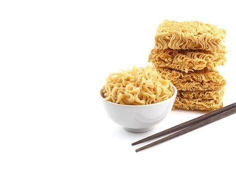Premium Photo Bowl Of Noodles And Heap Of Dry Noodle With Chopsticks