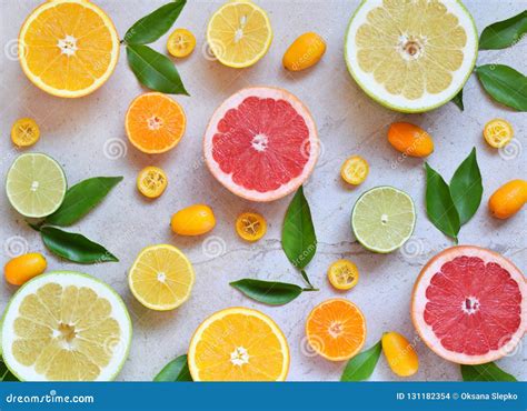 Set Of Citrus On Light Background Orange Mandarin Lemon Grapefruit