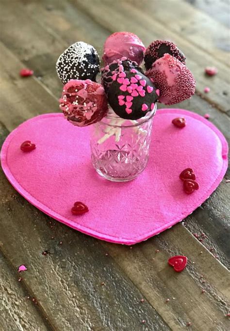 The bottom tier being 3' square and about 2' tall and the top being 2' cubed. Simple and Delicious Valentine Cake Pops | TheBestDessertRecipes.com