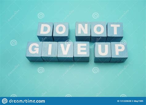 Do Not Give Up Word Made From Wooden Cube With Letters Alphabet On Blue
