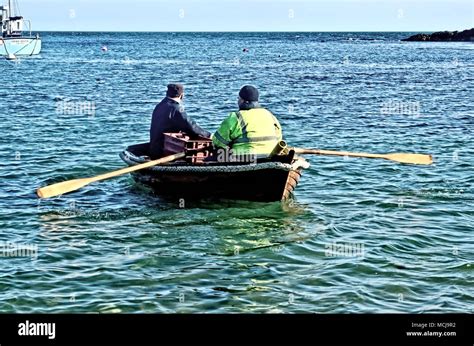 Two Men In A Boat Hi Res Stock Photography And Images Alamy