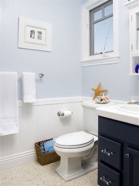 Light Blue Coastal Bathroom With Navy Vanity Small Bathroom Storage