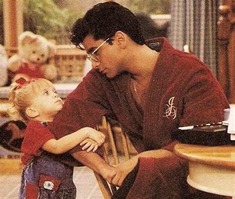 17 Unforgettable Uncle Jesse Outfits From Full House That Prove John