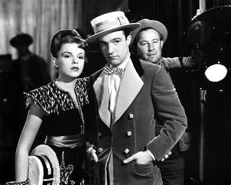 judy garland and gene kelly looking away photograph by globe photos fine art america