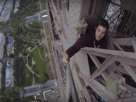 Two Men Secretly Climbed The Eiffel Tower At Night And Almost Got Away