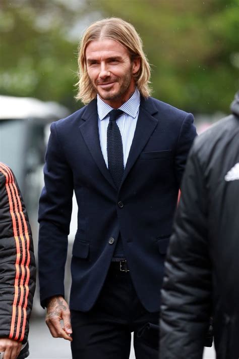 David Beckham Sports New Beachy Blonde Hairdo As He Heads To Manchester