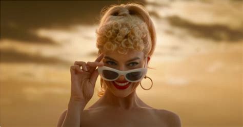 Barbie Movie First Looks Sees Margot Robbie On Beach In Black And White