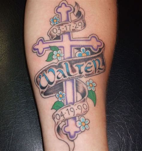 Colorful Memorial Cross Tattoo On Forearm