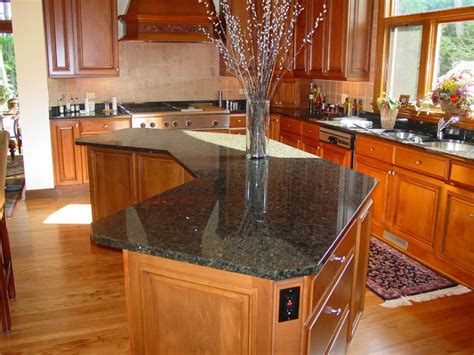 Ubatuba is quarried in brazil the popularity of uba tuba granite countertops is due to the affordable price and the aesthetic with proper lighting the countertop will appear sleek and black or may be accented for the earthy colors. Uba Tuba Granite - 1to1cabinets.com