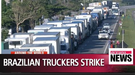 Brazilian truckers strike for fourth day as diesel tax cuts stall - YouTube
