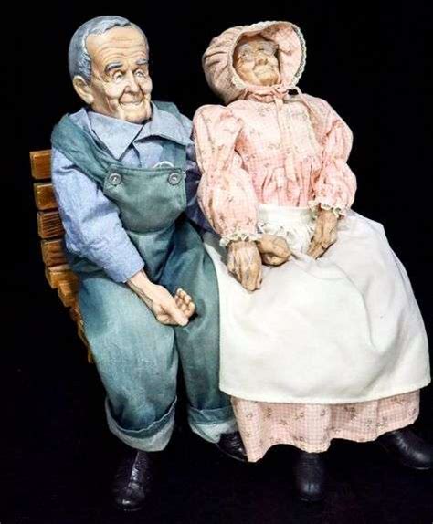 Vintage Grandma And Grandpa Dolls Sculptures Sitting On A Bench Appx