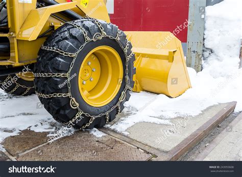 Tractor Tires With Chains In The Snow Stock Photo 243959608 Shutterstock