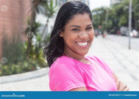 Portrait Of A Native Latin Woman In A Pink Shirt In City Stock Image Image Of Caucasian