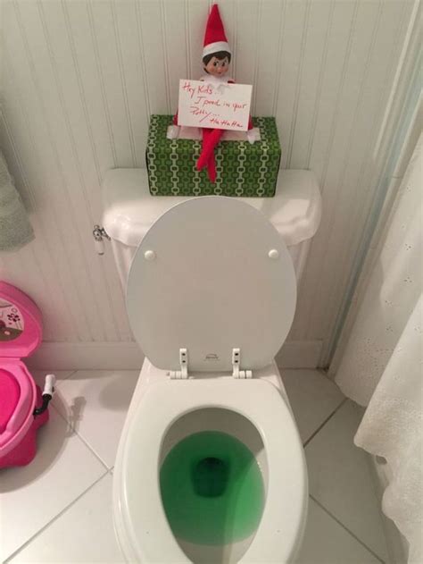 An Elf Is Sitting On Top Of The Toilet In The Bathroom With Green Water