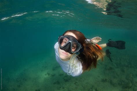 Woman Snorkeling Submerged Underwater By Stocksy Contributor Jovana