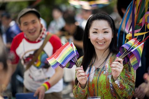tokyo rainbow pride parade 2012 blue sky above and a camera kit