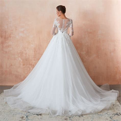Long sleeve lace sheaths from shabi and israel 2015 bridal collection. Princess Tulle Lace Wedding Dress With 3 4 Sleeves High Neck