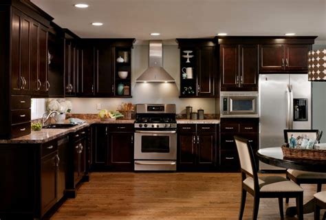 Solid wood, full overlay the solidity and synchronization that these espresso shaker cabinets emit, makes them a traditional yet efficient choice for today's kitchen cabinetry profiles. Kitchen Dark Cabinets Light Wood Floors | Espresso kitchen ...