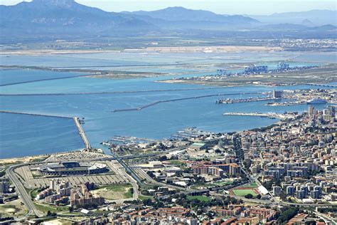 This cagliari beach is a whopping 8 km long stretch of fine sand that starts in sella del diavolo (devil's saddle), one of the landmarks of cagliari, and goes all the way to. Cagliari Harbor in Cagliari, Sardinia, Italy - harbor ...