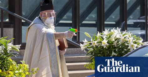 Detroit Priest Sprays Holy Water From Squirt Gun To Maintain Social