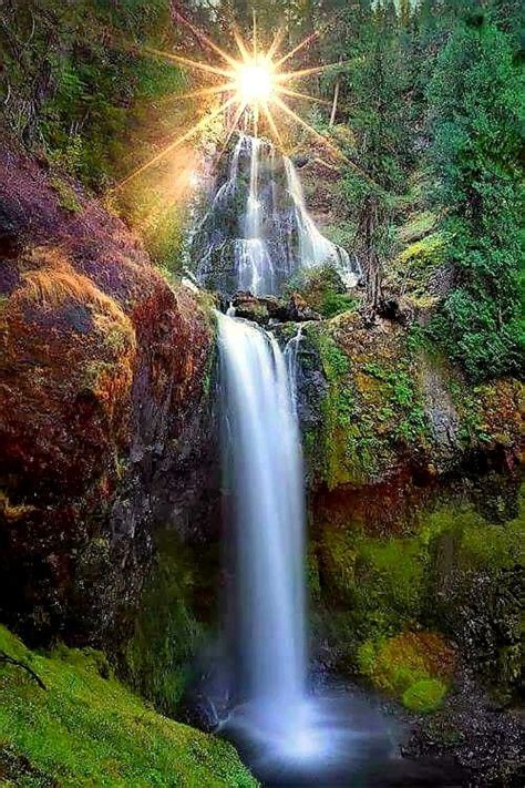 Sunrise Over A Waterfall Waterfall Beautiful Nature