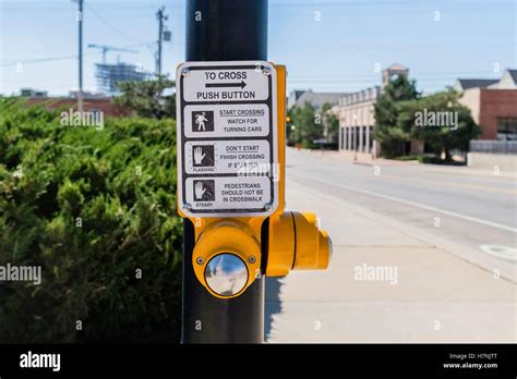 A Pedestrian Crossing Sign On A Pole In Oklahoma City Oklahoma Usa