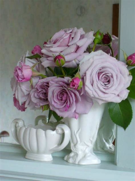 Фото Фиолетовые розы в вазе