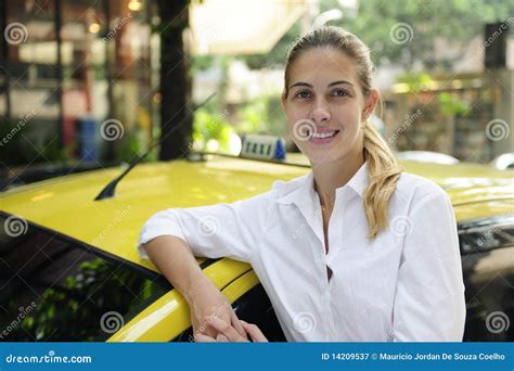 Portrait Of A Female Taxi Driver With Her New Cab Royalty Free Stock