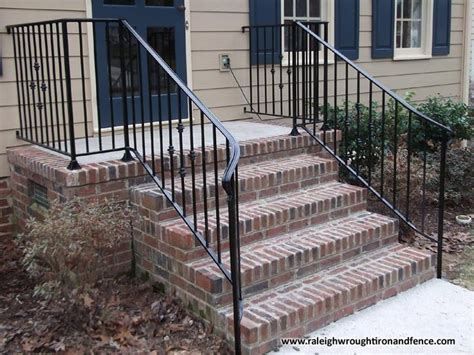 Much more than a safety feature, a wrought iron stair railing is an elegant addition to any staircase or balcony. Durham NC Iron Railing Fabricator | Exterior stair railing ...