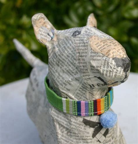 Large Papier Maché Bull Terrier with Green Striped Collar and Bobble