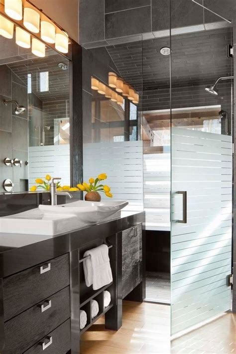 A remote control will work through the glass; semi transparent frameless shower doors cool vessel sink ...