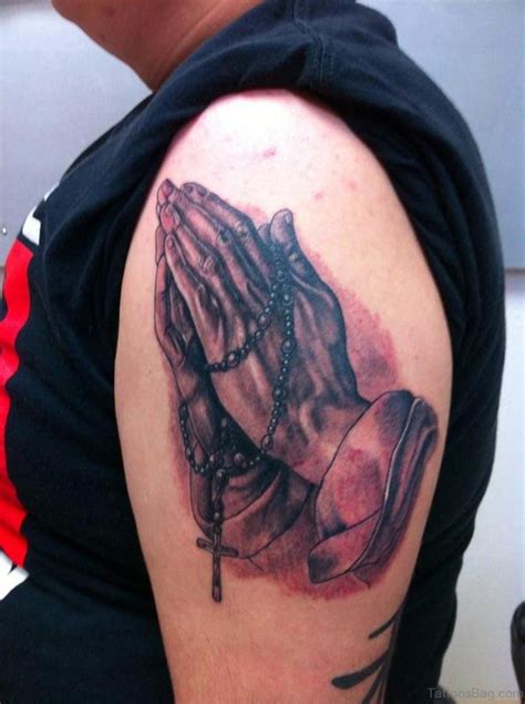 50 Outstanding Praying Hands Tattoos On Shoulder Tattoo Designs