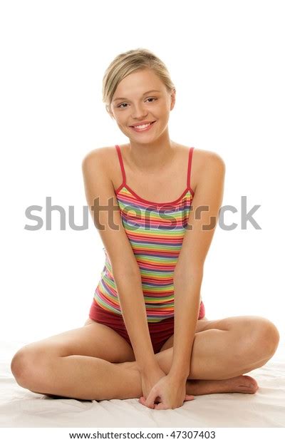 Стоковая фотография 47307403 Teenage Girl Sitting Crossed Legs