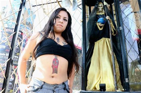 Santa Muerte Shrine And Devoteee Outside Of Mexico City Santa Muerte Wonder Woman Superhero