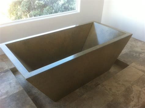 Taking a moment to unwind has never felt better. Bath | Designer Concrete Countertops, Vero Beach, FL