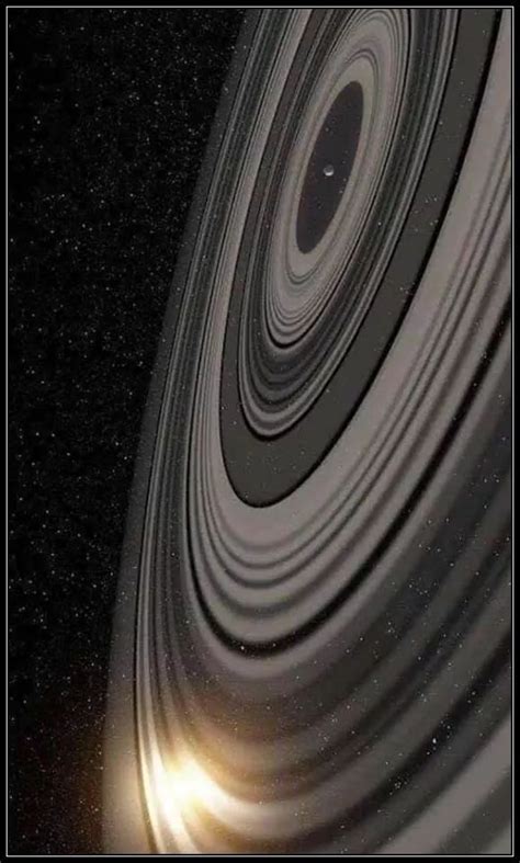 Artist's conception of the extrasolar ring system circling the young giant planet or brown dwarf j1407b. This is Planet J1407b. Its ring system is 200 times larger ...