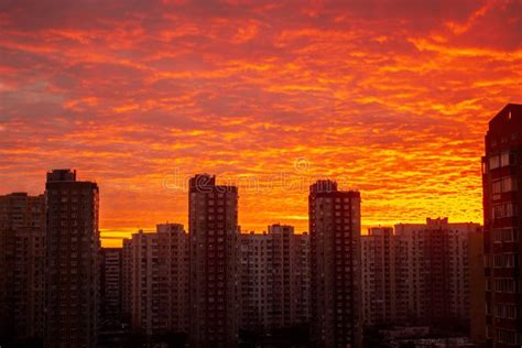 Colorful Sunset In Red Among The Sleeping Area Of High Rise Buildings