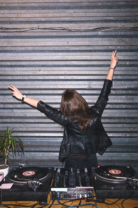 Female Dj Having Fun Holding Hands Up With Peace Signs Del
