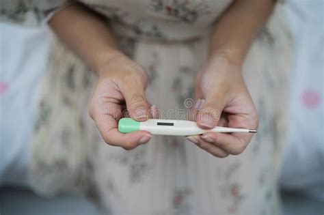 Young Woman Hand Holding A Digital Thermometer Stock Image Image Of