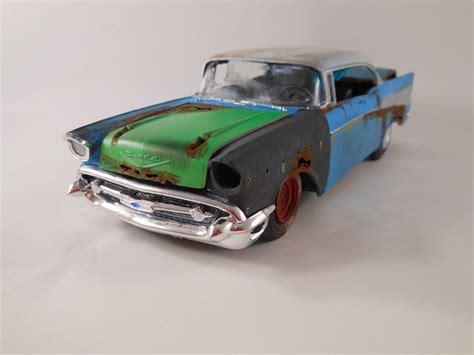 1957 Chevrolet Bel Air 124 Scale Model Car In Blue And White