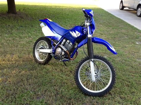 The task is selecting a specific bike out of all the brands and types available in the market. Buy 2006 Yamaha TTR 250 Dirt Bike on 2040-motos