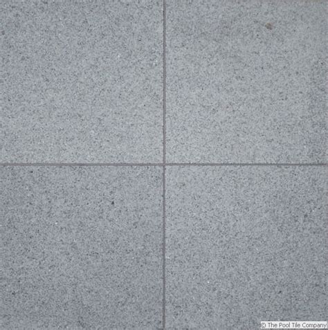 This stone comes from brazil, and is made with natural quartz pockets, which add to the elegance of the design. Dark Grey Granite Pool Tiles and Coping. Outdoor Pavers and Coping