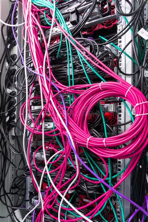 Network Cables Connected Into Server Inside Data Center Stock Photo
