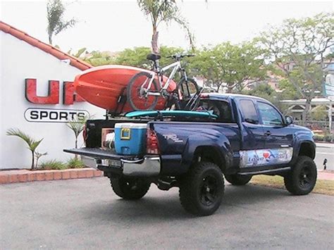 Toyota Tacoma With L2s Sport Rack System Carrying Surfboard Bike