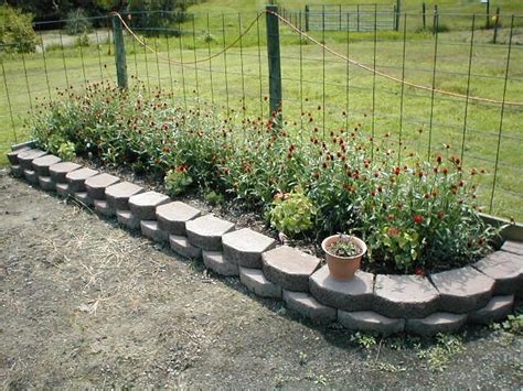 This is a larger version of our garden bed with legs. Raised Bed Garden Ideas: Stacked Landscape Paver Raised ...
