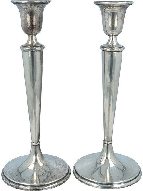 2 Tall Candlesticks Silver