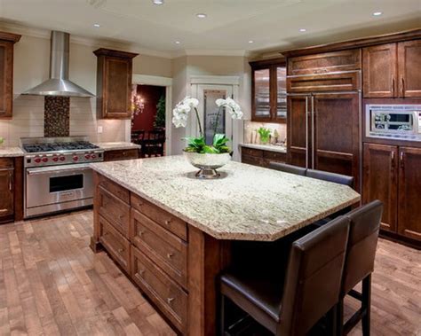L shaped kitchen features white shaker cabinets paired with white quartz countertops. Center Island With Stove Home Design Ideas, Pictures ...