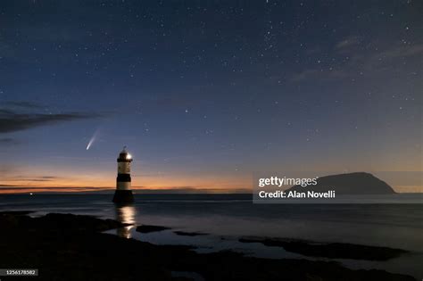 Comet Neowise And The Night Sky Above Trwyn Du Lighthouse And Puffin